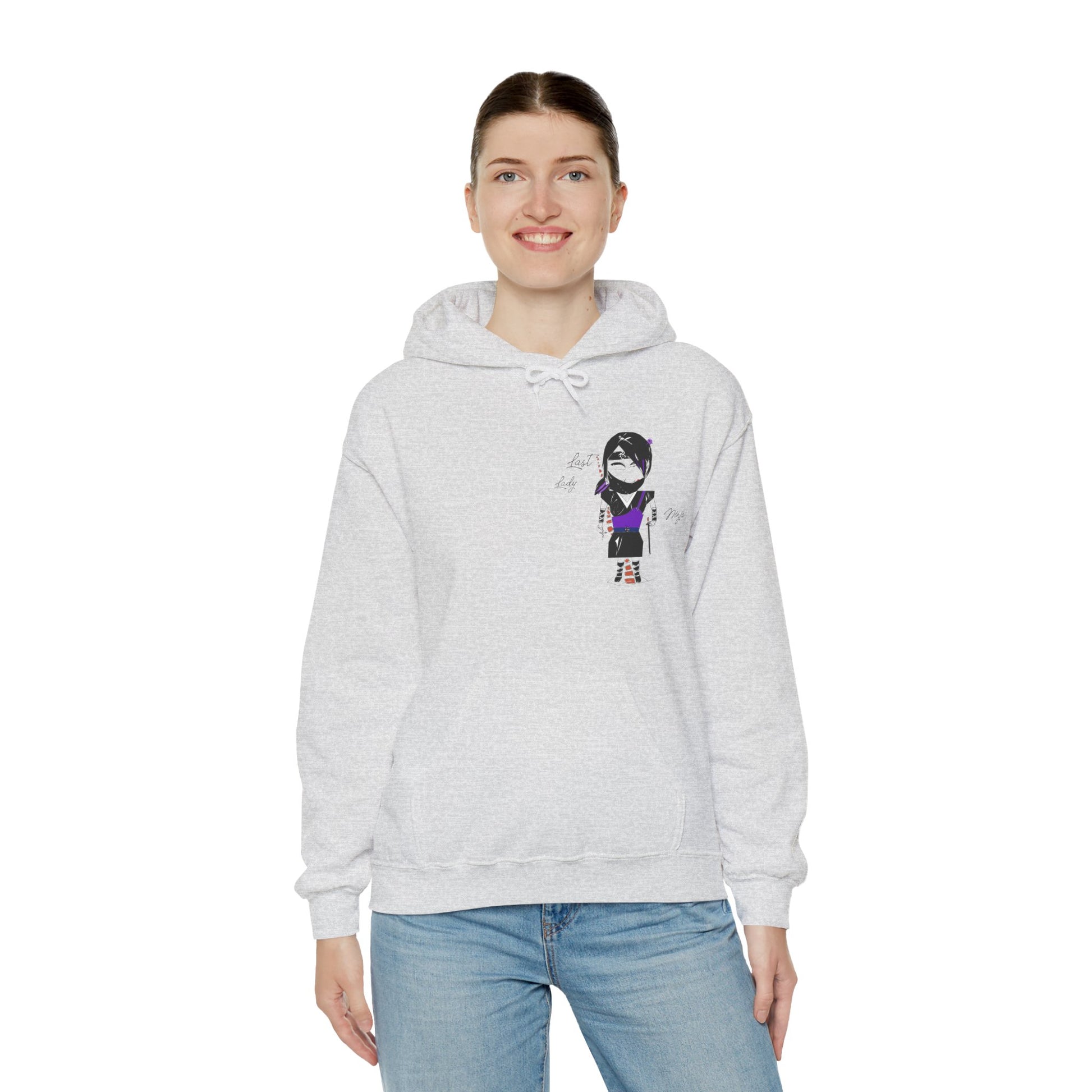 Front view of a lady model wearing a gray hoodie with a lady ninja graphic design on a white background