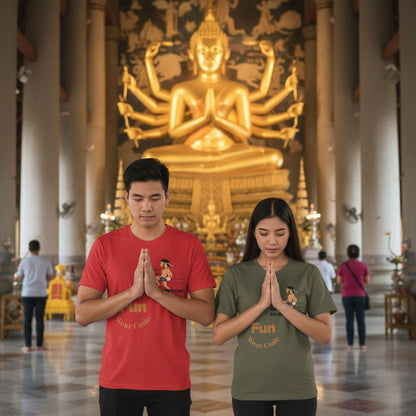 A Thai couple wearing a Thai boxer design tee stands in a temple