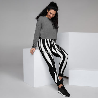 Woman wearing a gray sweater and black and white striped pants with a 'Fun Wear Code' logo on a white background