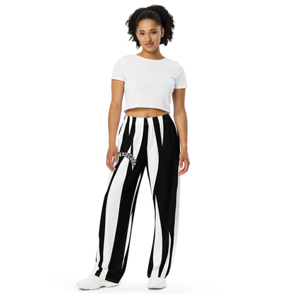 Woman wearing a white crop top and black and white striped pants with a 'Fun Wear Code' text logo on a white background