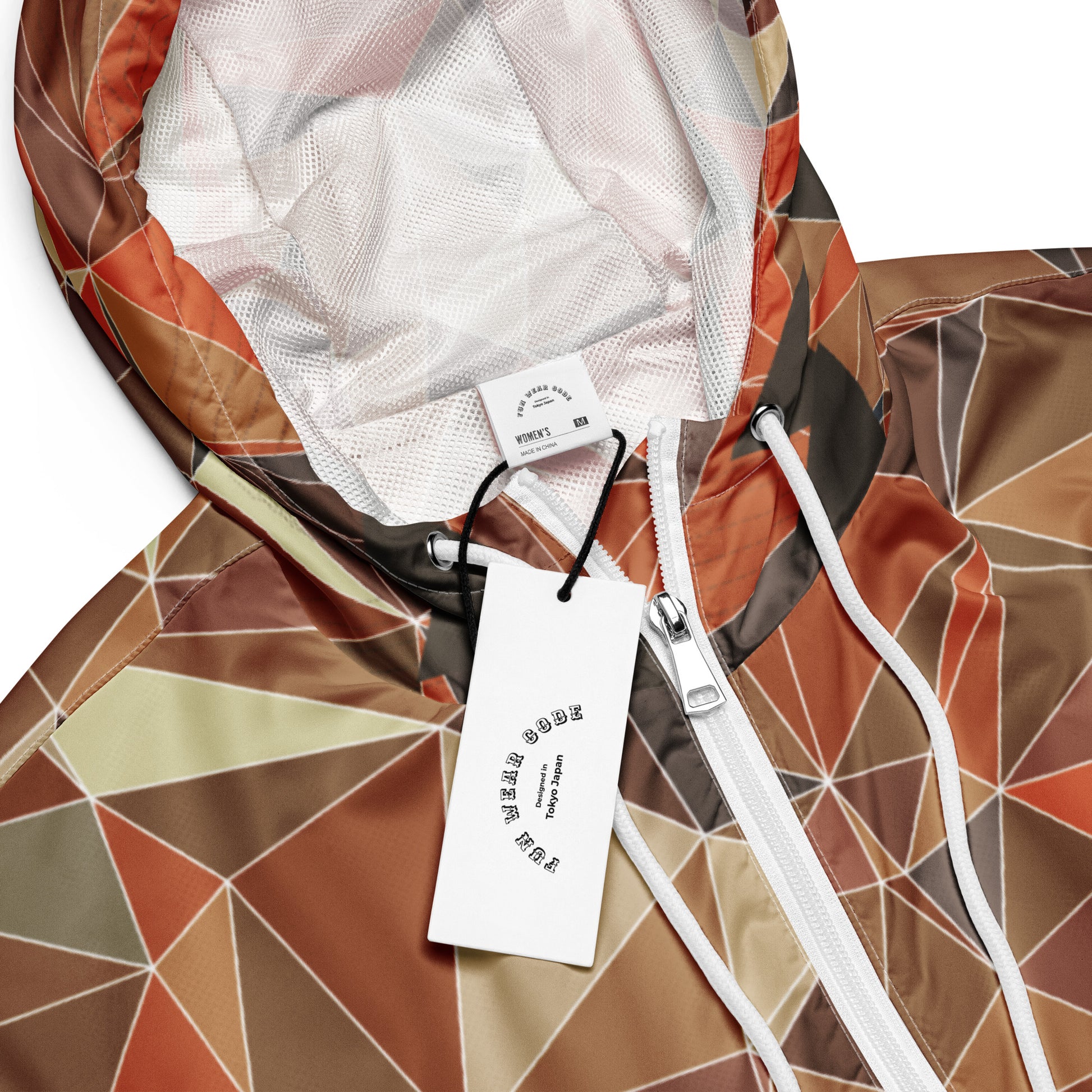 Geometric-patterned jacket with a Fun Wear Code tag on a white background