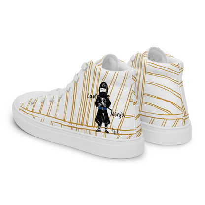 White high-top sneakers with gold stripes and a graphic of a ninja on a white background