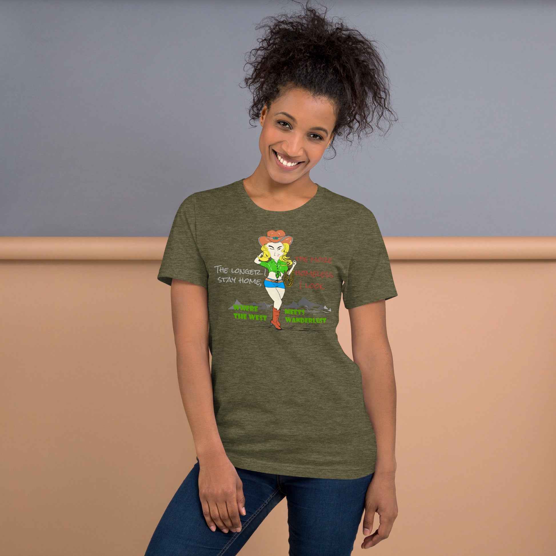 Woman wearing a green t-shirt with a playful cowgirl graphic design and text, standing against a plain background.